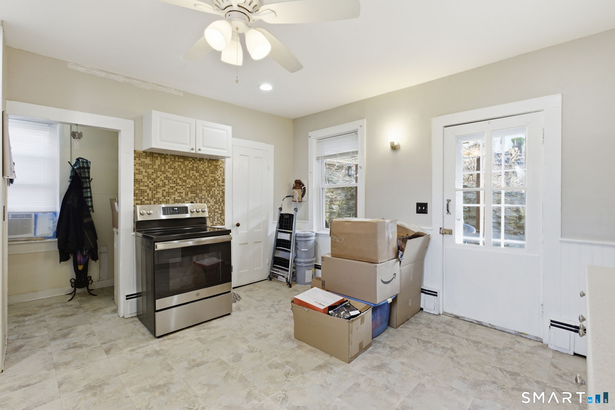 Undisclosed Address Vernon, CT 06066 - Photo 11 of 31 a living room with furniture and a flat screen tv