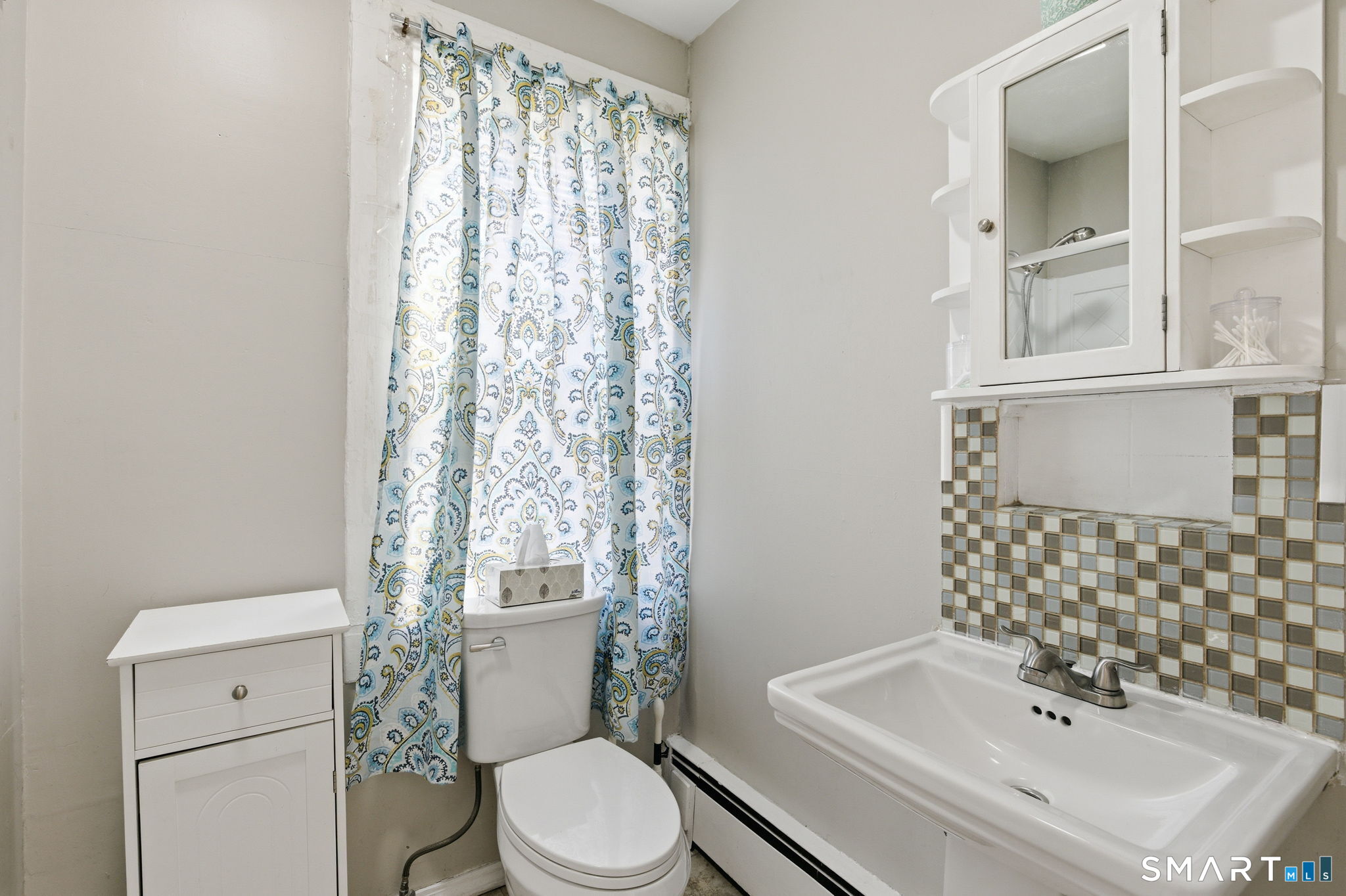 Undisclosed Address Vernon, CT 06066 - Photo 18 of 31 a bathroom with a sink toilet and shower