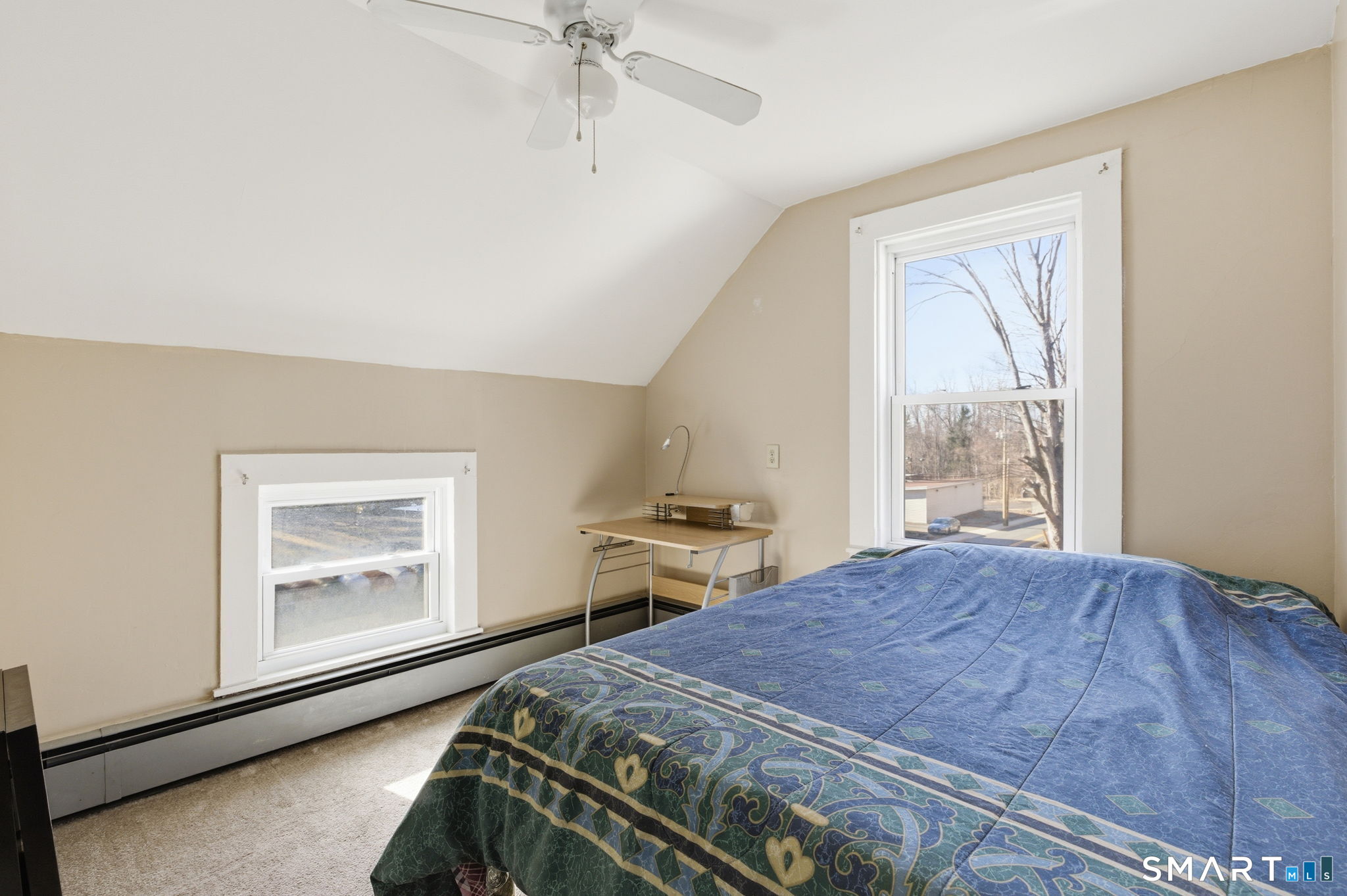 Undisclosed Address Vernon, CT 06066 - Photo 26 of 31 a bedroom with a bed and a window