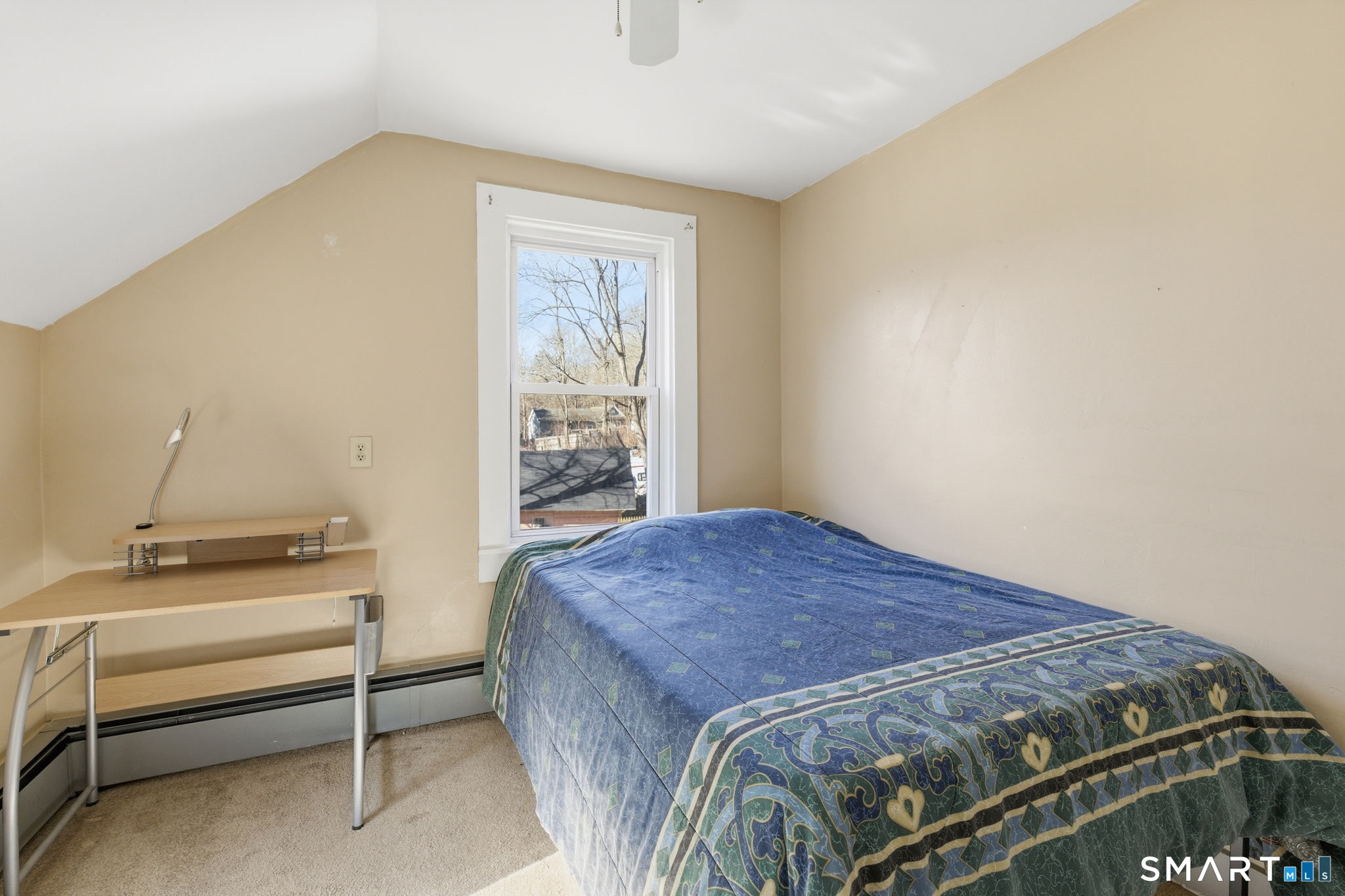 Undisclosed Address Vernon, CT 06066 - Photo 27 of 31 a bedroom with a bed and a window