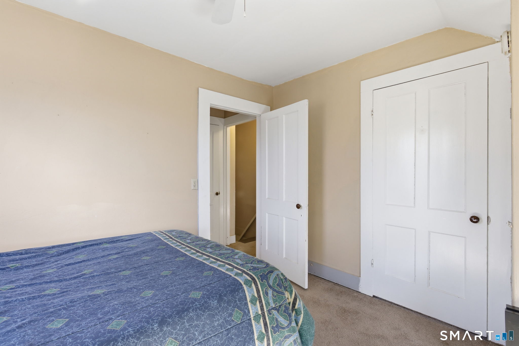 Undisclosed Address Vernon, CT 06066 - Photo 28 of 31 a bedroom with a bed and a closet