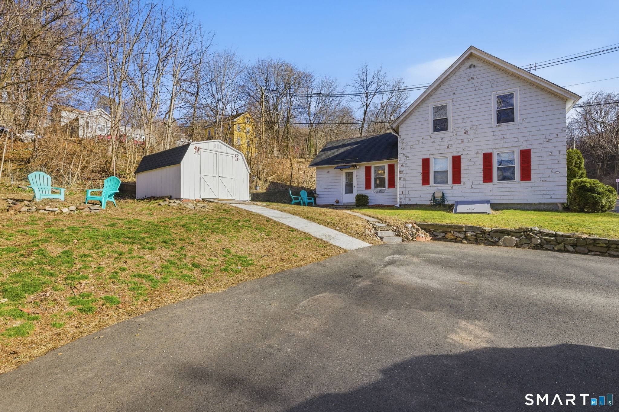 Undisclosed Address Vernon, CT 06066 - Photo 30 of 31 a front view of house with yard and trees