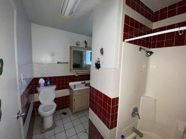 a view of a chair and tables in patio