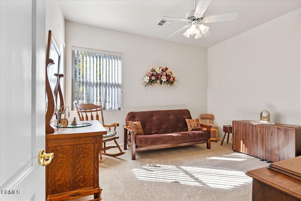 26450 Cumberland Road Tehachapi, CA 93561 - Photo 26 of 52 a living room with furniture and a window