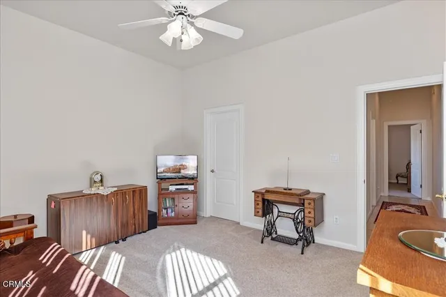 a view of hallway with wooden floor