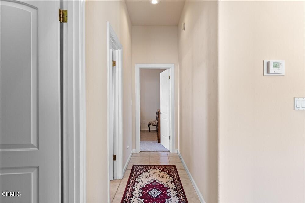 26450 Cumberland Road Tehachapi, CA 93561 - Photo 28 of 52 a view of hallway with wooden floor