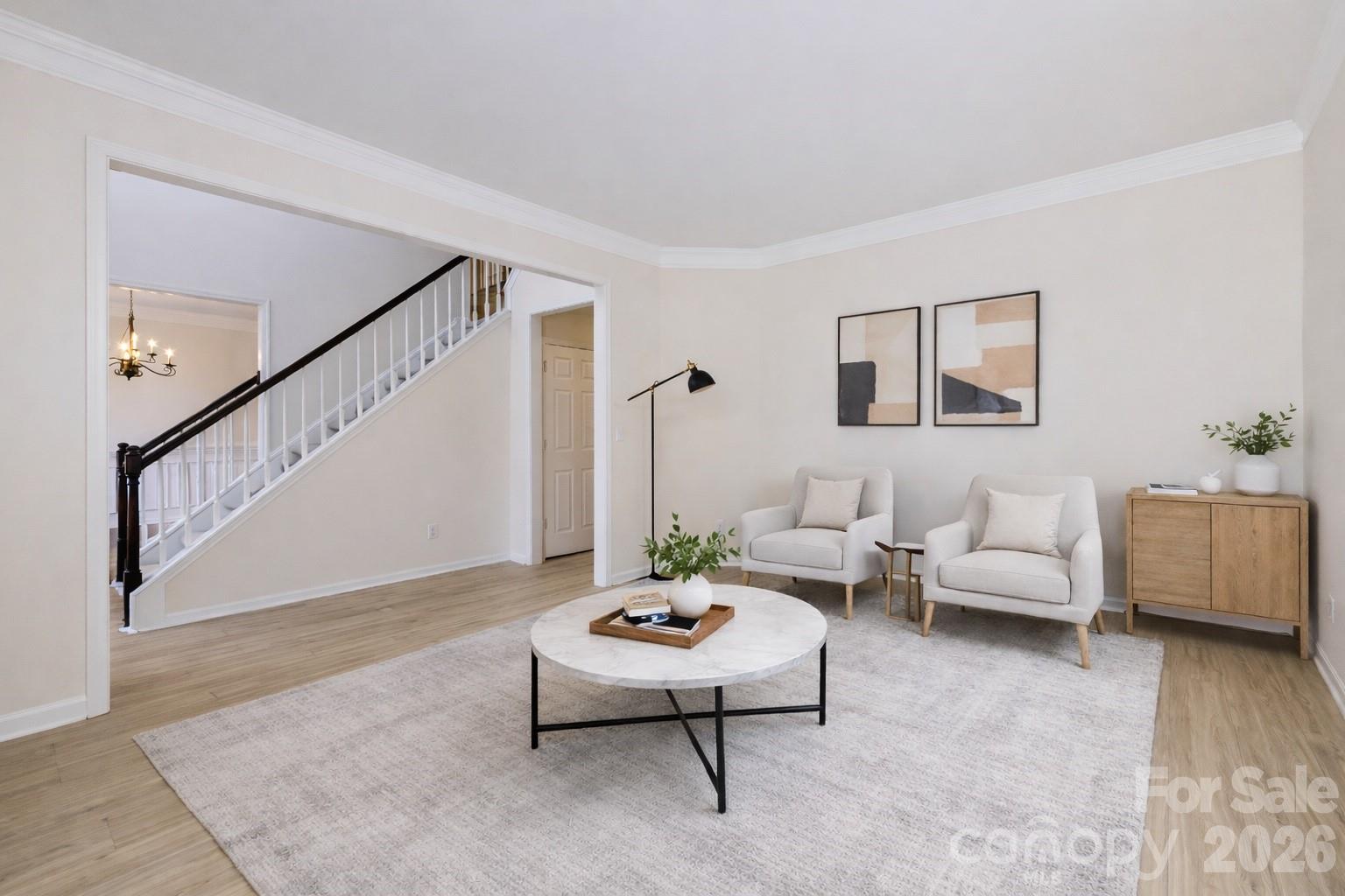 2705 Gosling Terrace Road Charlotte, NC 28262 - Photo 11 of 36 a living room with furniture and a table