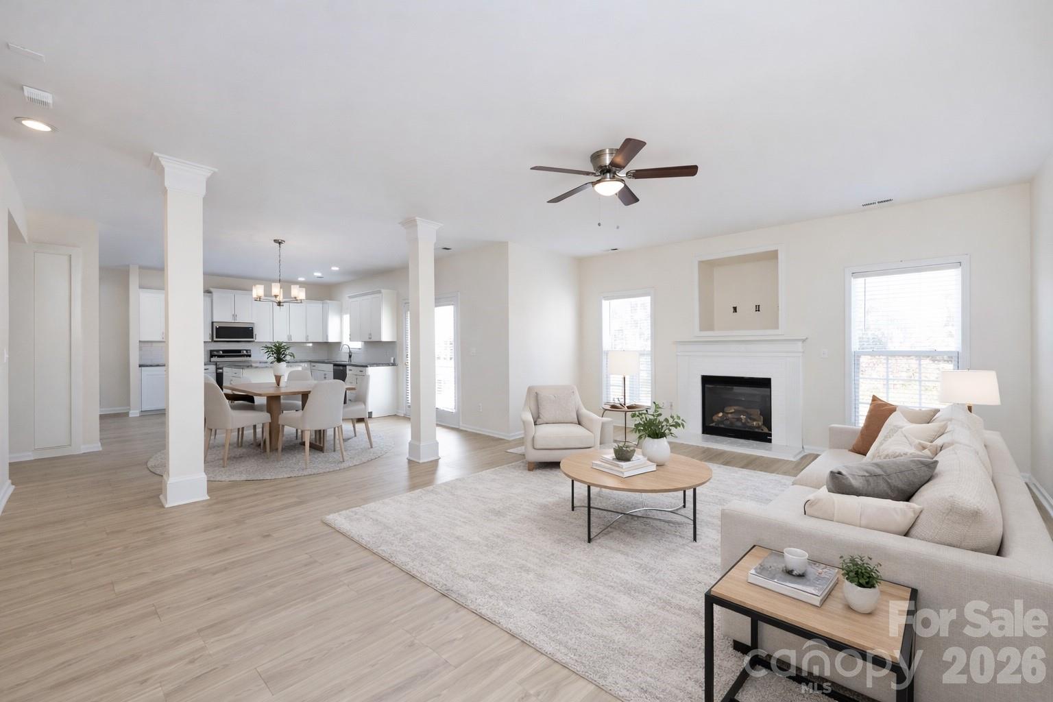 2705 Gosling Terrace Road Charlotte, NC 28262 - Photo 15 of 36 a living room with furniture and a fireplace