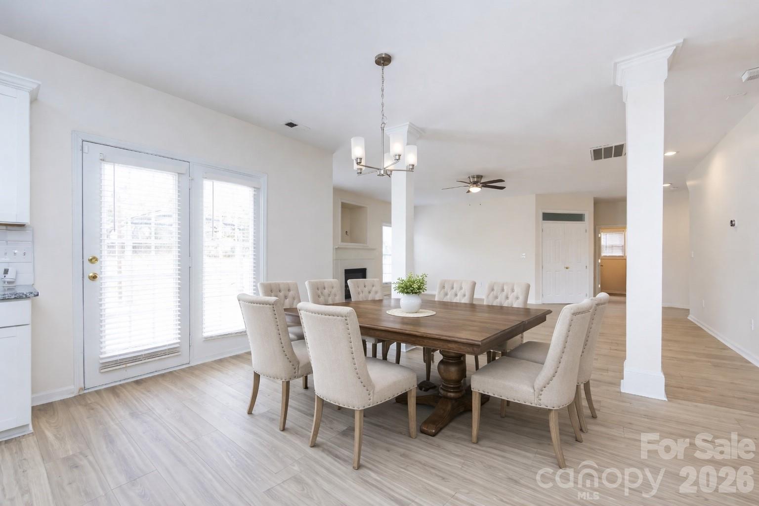 2705 Gosling Terrace Road Charlotte, NC 28262 - Photo 20 of 36 a view of a dining room with furniture window and wooden floor