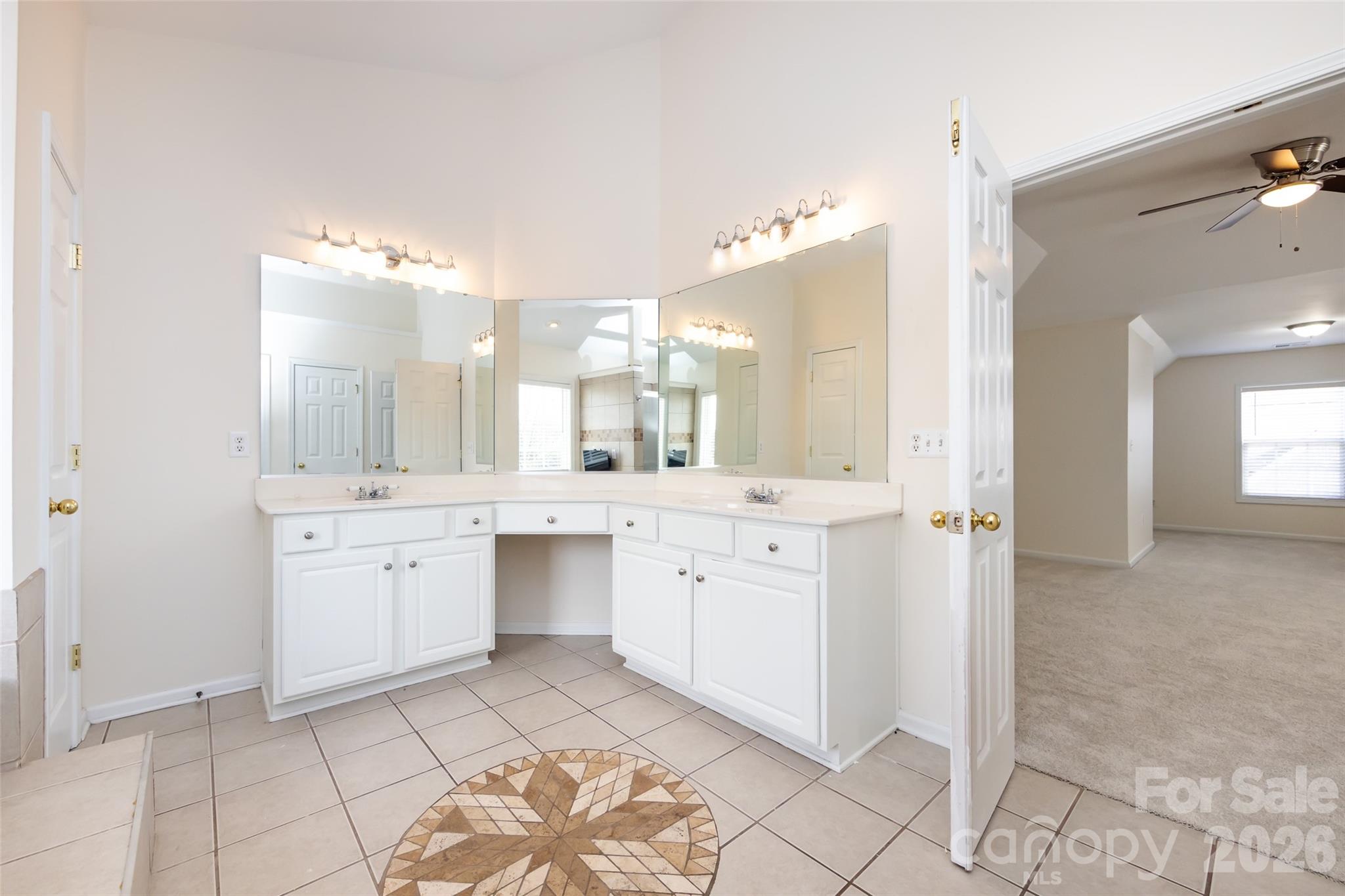 2705 Gosling Terrace Road Charlotte, NC 28262 - Photo 36 of 36 a bathroom with a granite countertop sink mirror and a