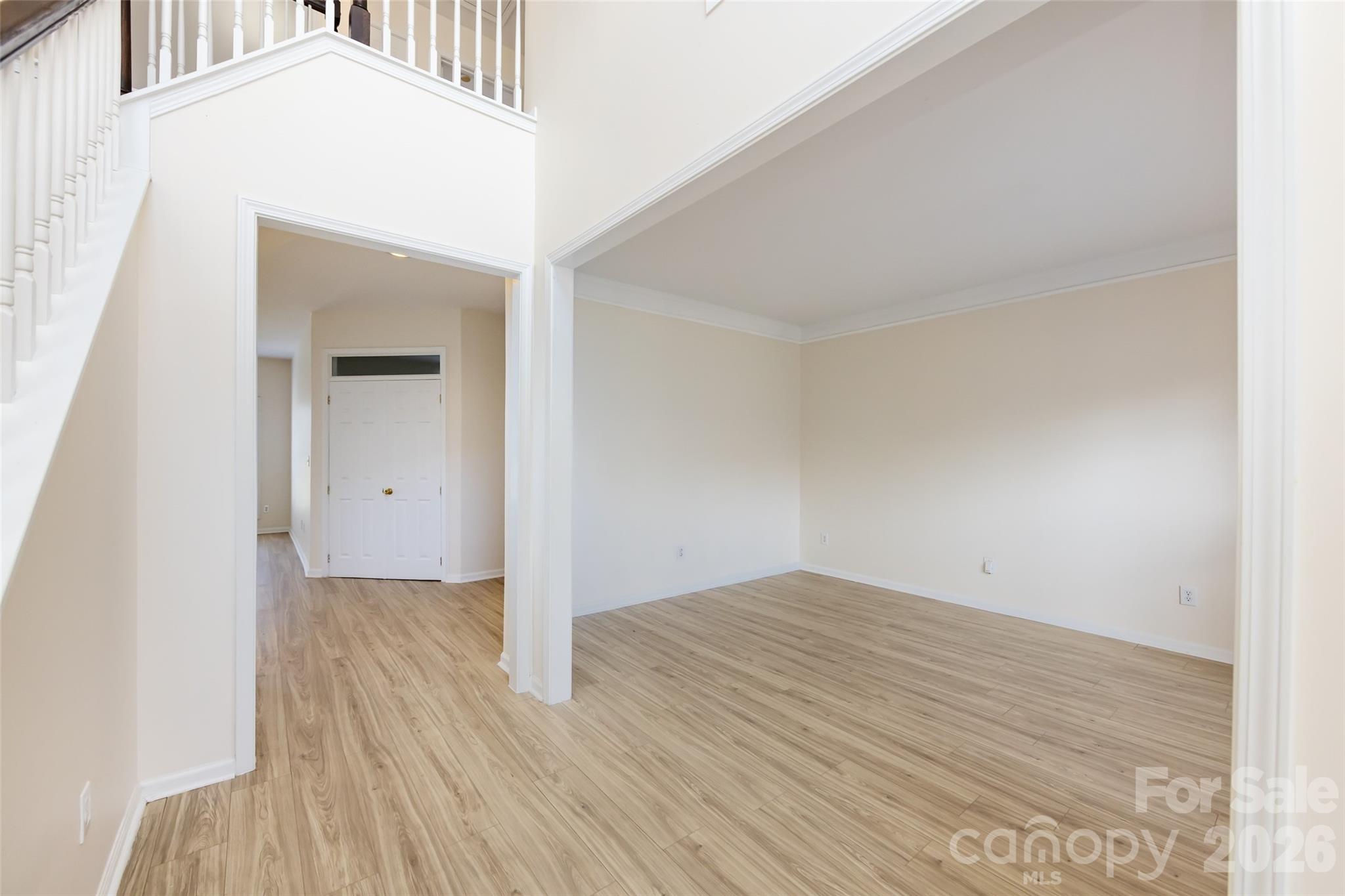 2705 Gosling Terrace Road Charlotte, NC 28262 - Photo 6 of 36 wooden floor in a hall with an entryway