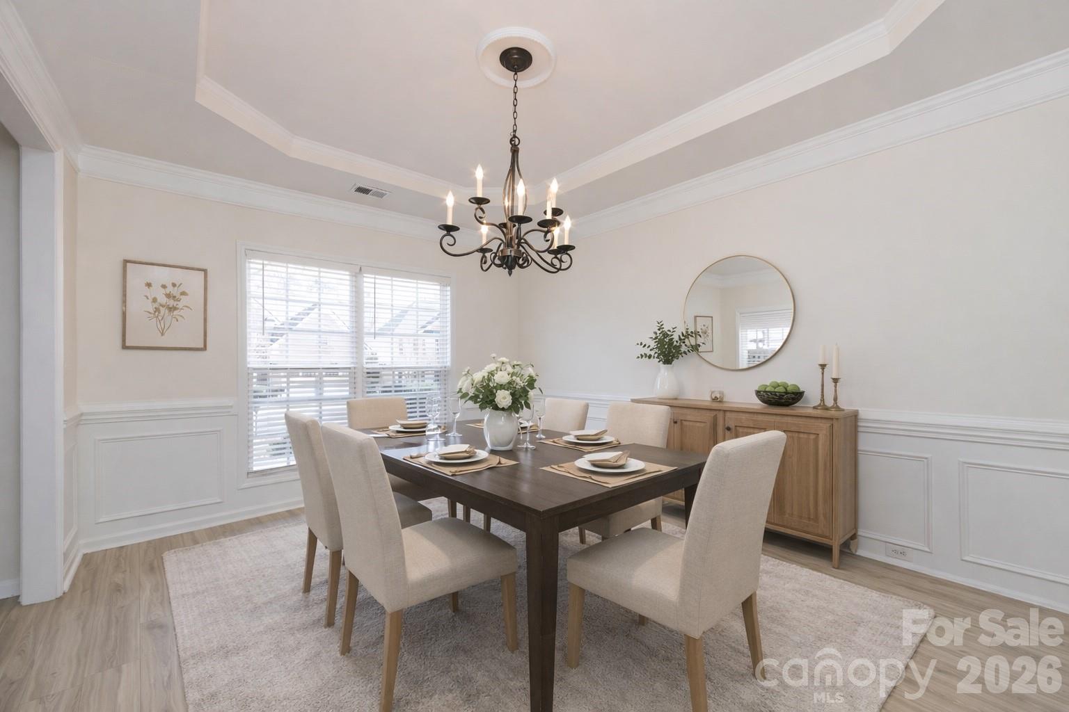 2705 Gosling Terrace Road Charlotte, NC 28262 - Photo 9 of 36 a view of a dining room with furniture and chandelier