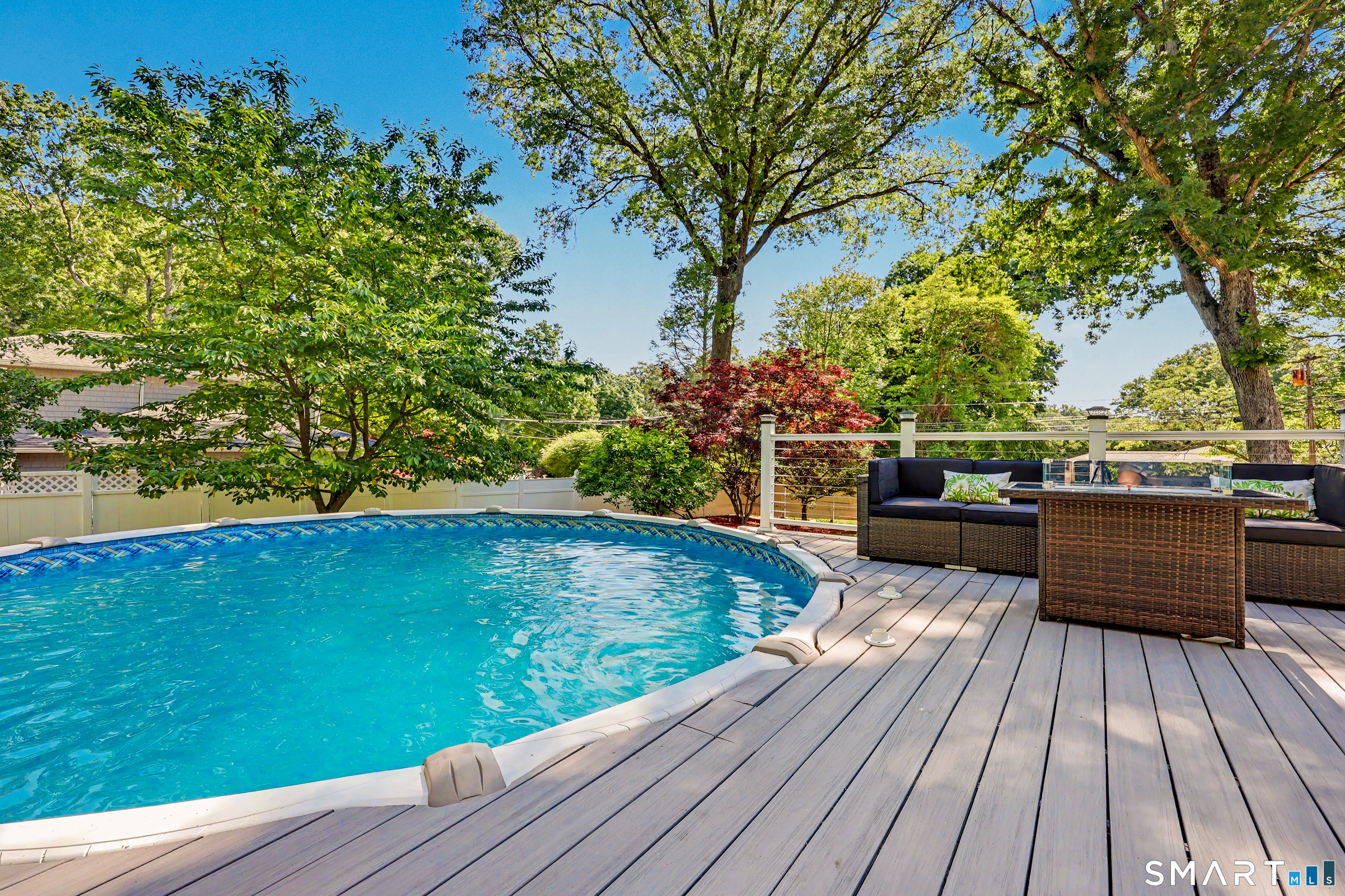 5 Caddy Road Norwalk, CT 06851 - Photo 5 of 34 Outdoor oasis with pool and decking for great entertaining .