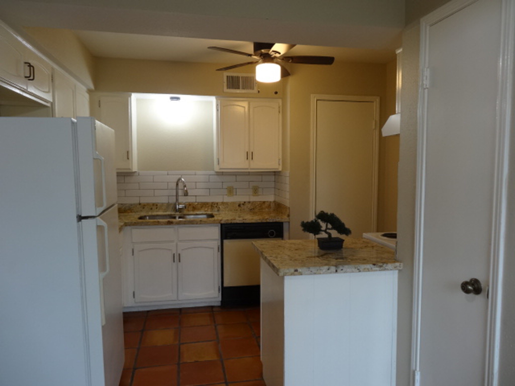 5522 Deep Forest Drive Houston, TX 77092 - Photo 5 of 47 a bathroom with a granite countertop sink a mirror and a shower