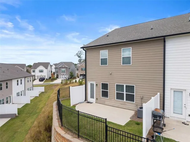 a front view of a house with glass windows