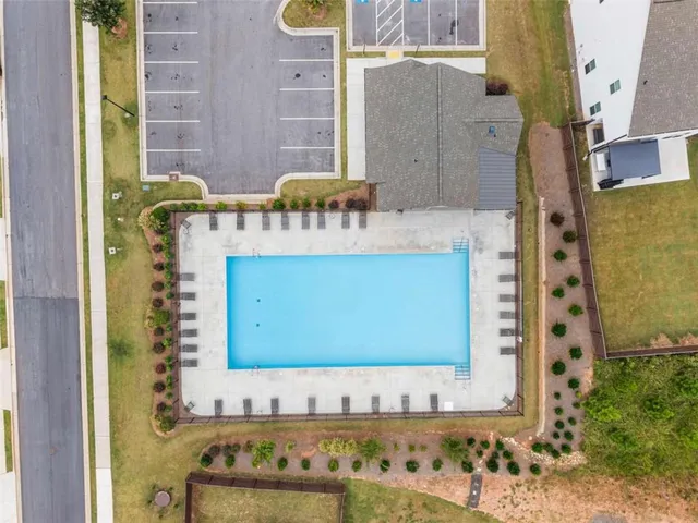 a view of a door with a chair and bench