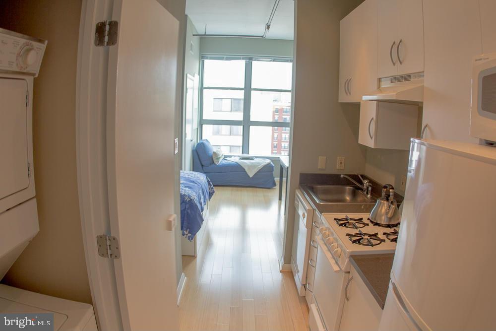 1300 N Street Northwest, Unit 812 Washington, DC 20005 - Photo 5 of 20 Galley Kitchen (laundry closet here)