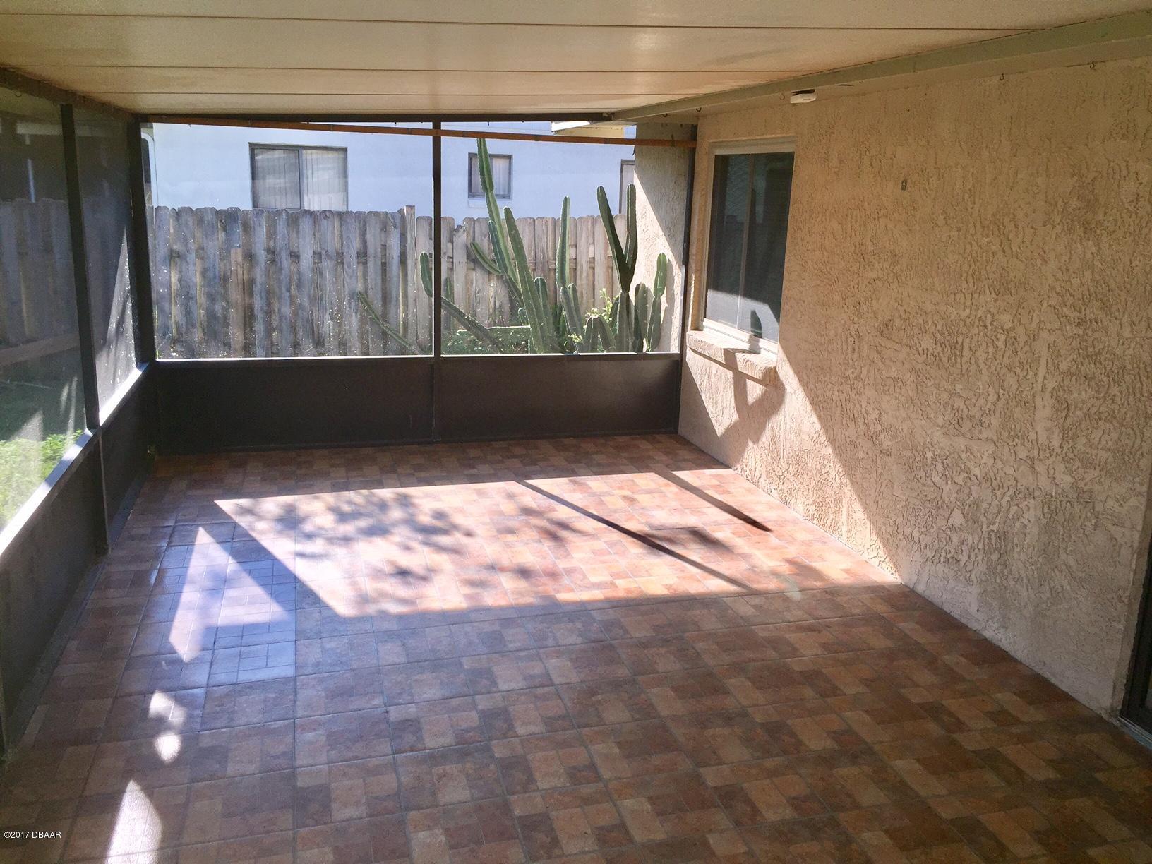 740 Hawks Ridge Road Port Orange, FL 32127 - Photo 14 of 25 back porch cleared 2