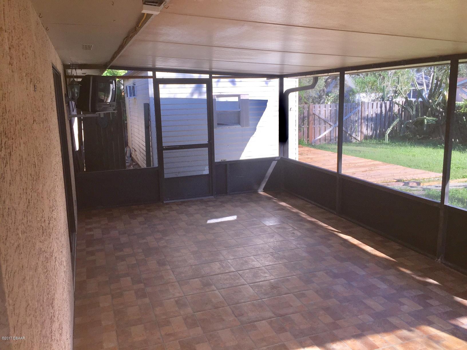 740 Hawks Ridge Road Port Orange, FL 32127 - Photo 15 of 25 back porch cleared