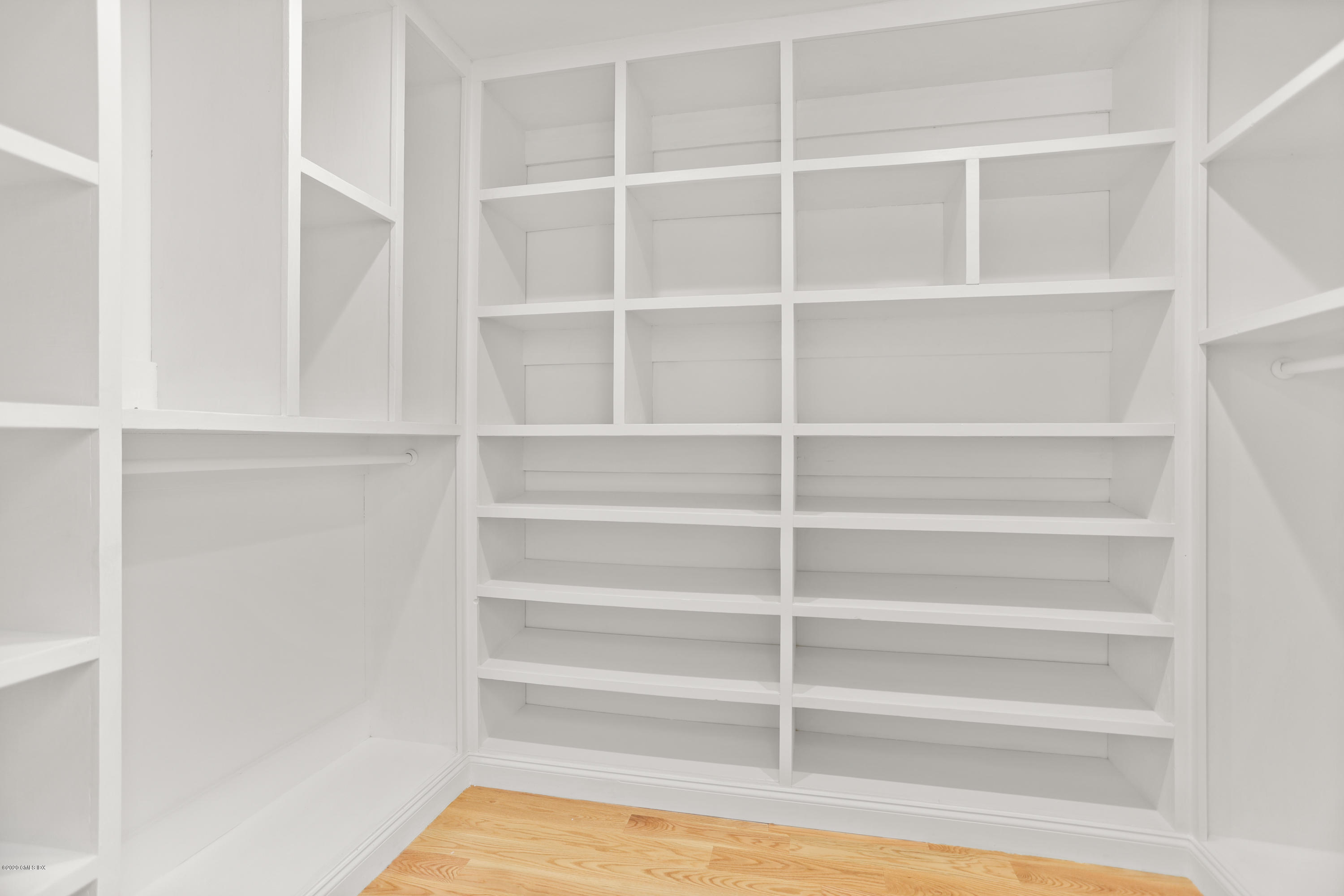 125 Hamilton Avenue, Unit 2 Greenwich, CT 06830 - Photo 14 of 20 a view of walk in closet with empty racks