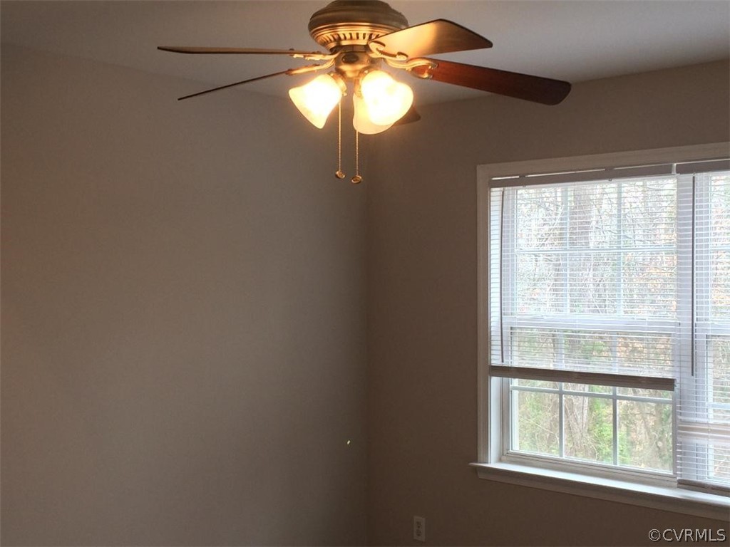 6330 Oak Drive Quinton, VA 23141 - Photo 15 of 21 a bathroom with a window and a chandelier