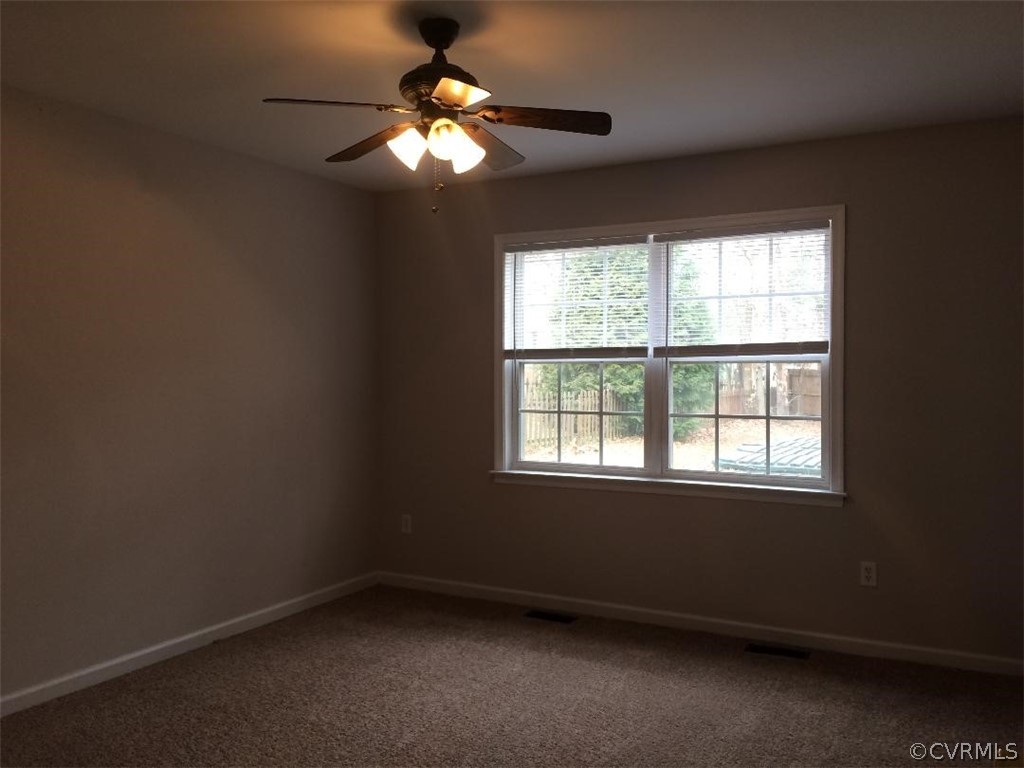 6330 Oak Drive Quinton, VA 23141 - Photo 17 of 21 an empty room with a window