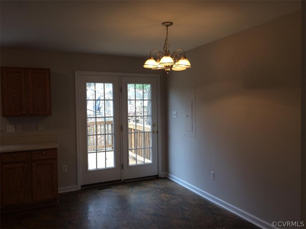 6330 Oak Drive Quinton, VA 23141 - Photo 10 of 21 a view of a windows and chandelier in a room