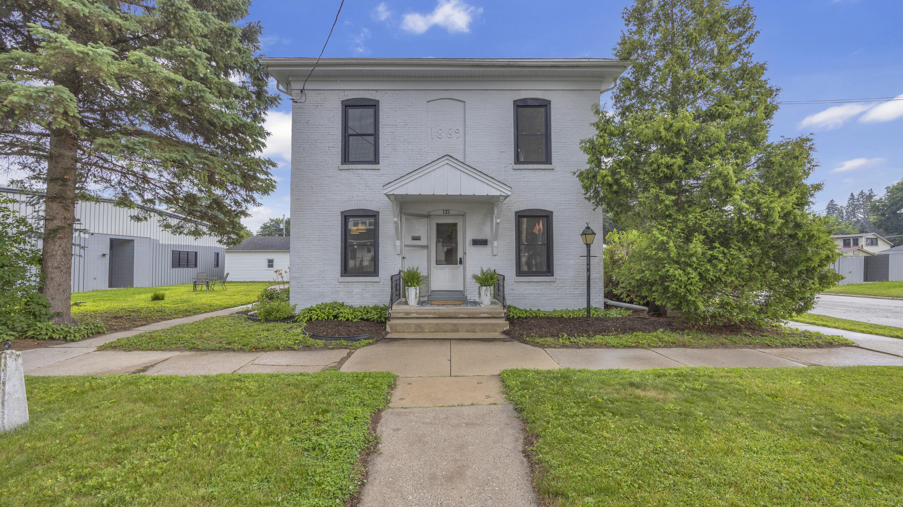 121 Cedar Street Sheboygan Falls, WI 53085 - Photo 1 of 41 Front Yard