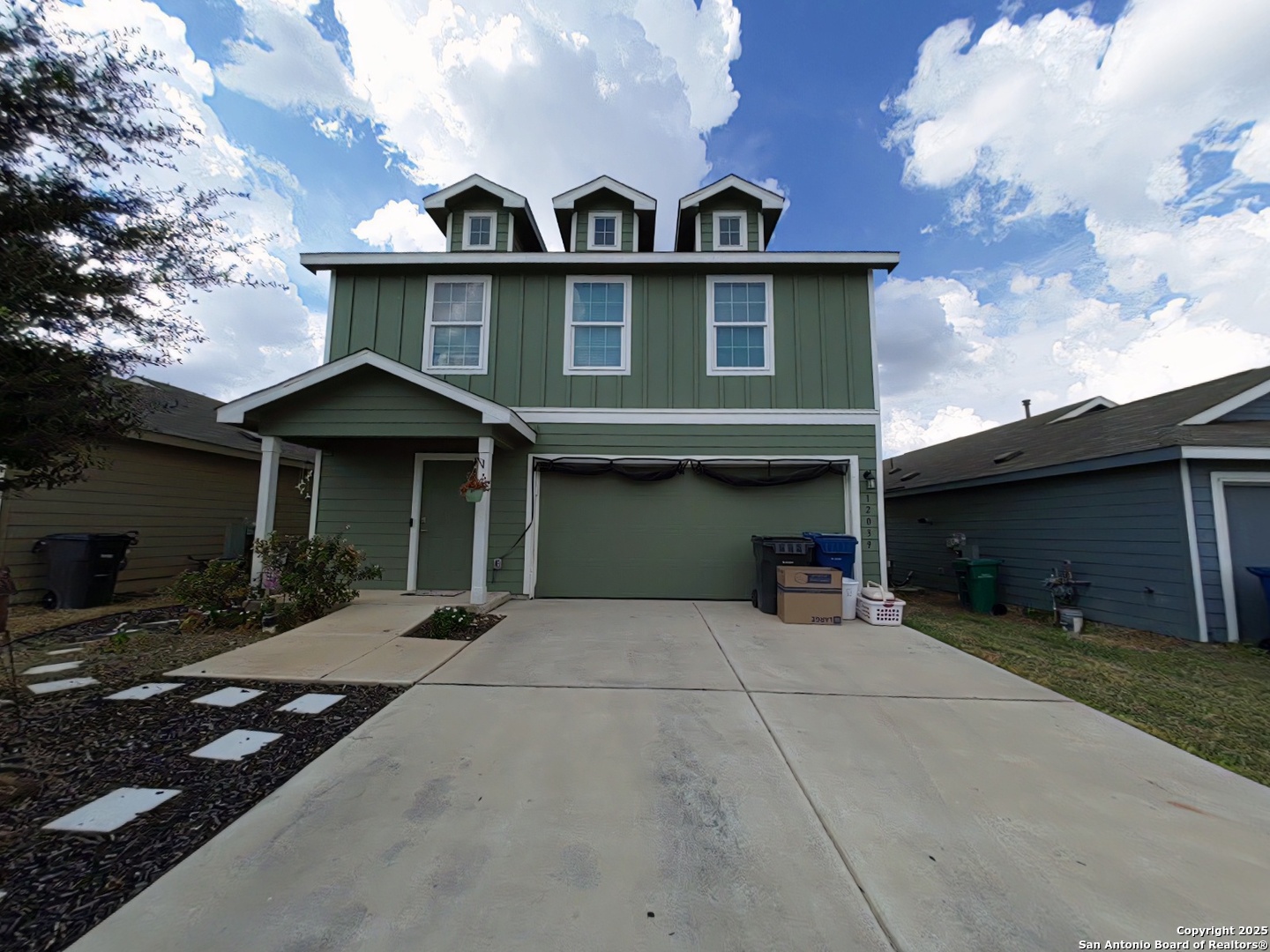 12039 Still Pass San Antonio, TX 78221 - Photo 1 of 19 front view of a house with yard