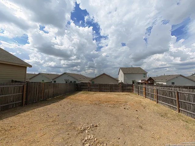 a view of a terrace with a bench