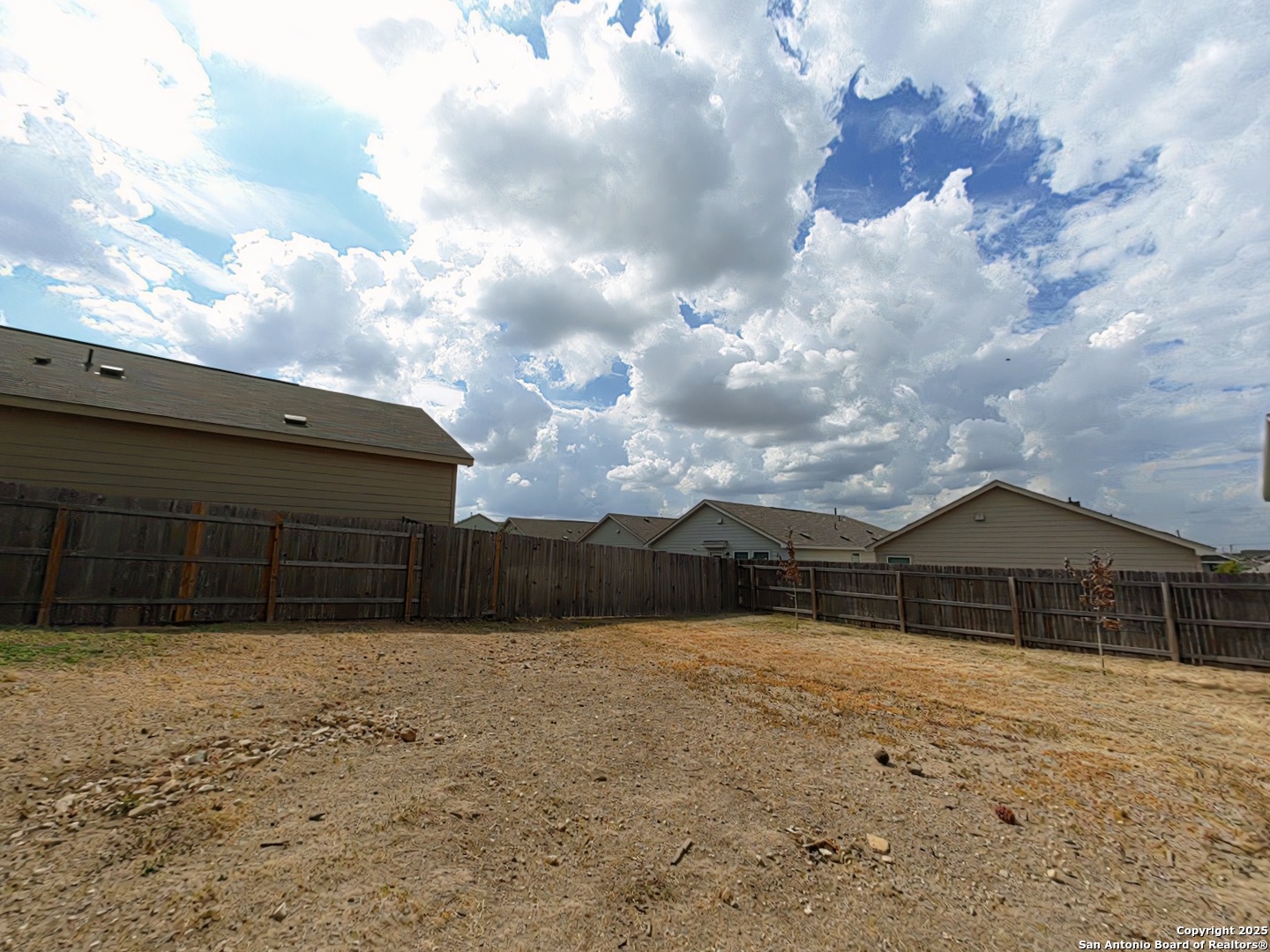 12039 Still Pass San Antonio, TX 78221 - Photo 19 of 19 a front view of house with a yard
