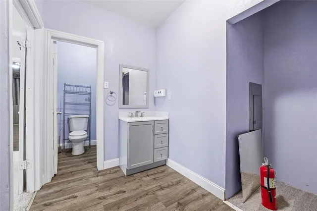 a bathroom with a sink toilet and bathtub