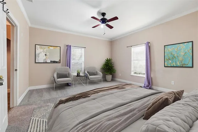 an empty room with closet and windows