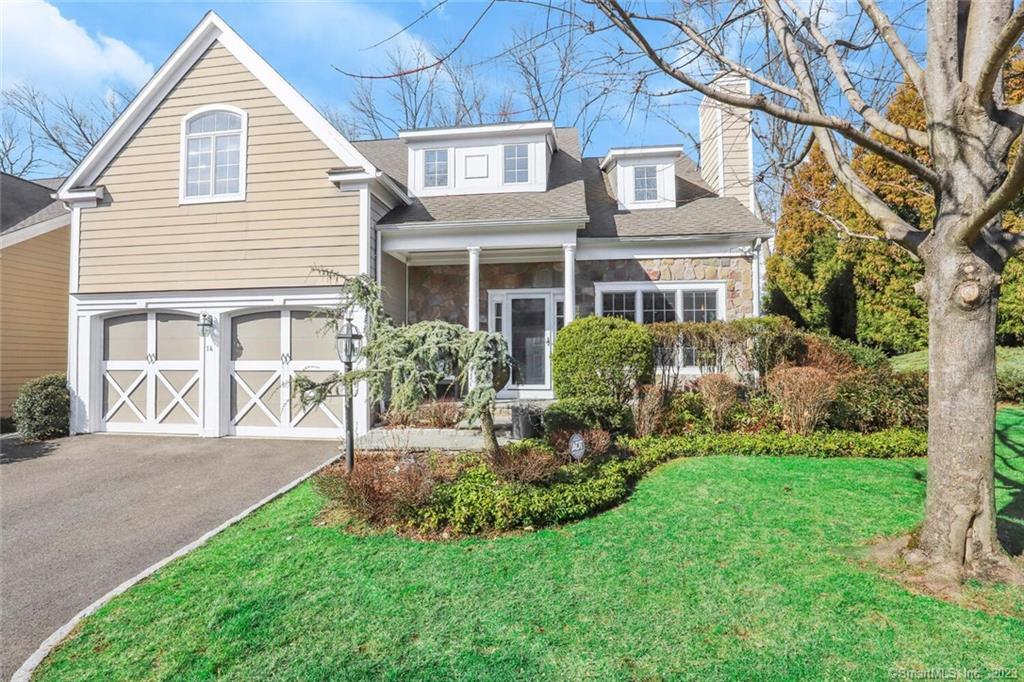 154 Pepper Ridge Road, Unit 14 Stamford, CT 06905 - Photo 1 of 1 a view of a house with a yard and sitting area