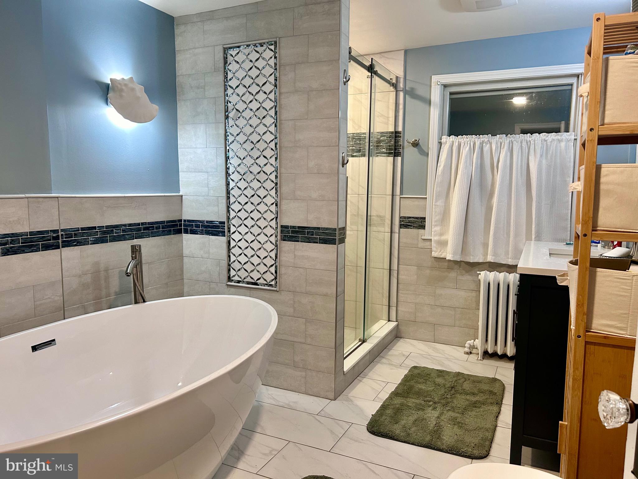 2415 Second Street Pike Newtown, PA 18940 - Photo 36 of 51 a bathroom with a bathtub and a shower