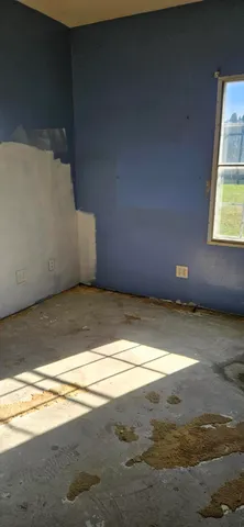 a view of kitchen with furniture and window