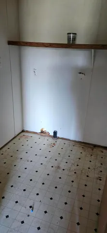 an empty room with a window