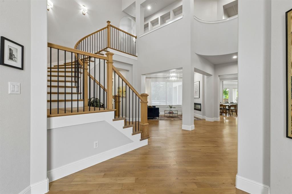 6700 Herbert Road Colleyville, TX 76034 - Photo 3 of 32 a view of entryway and hall with wooden floor