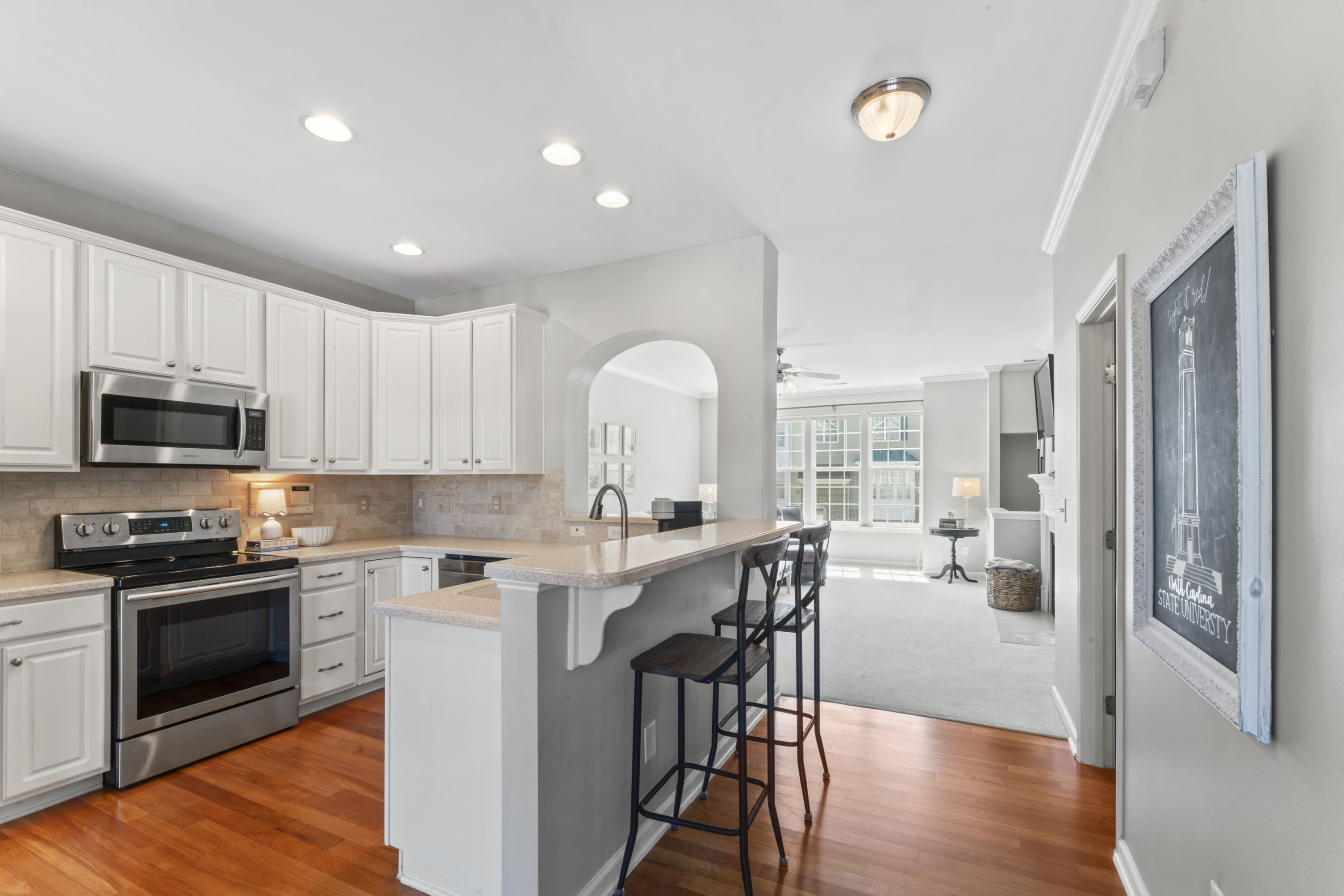 5414 Silver Moon Lane Raleigh, NC 27606 - Photo 3 of 46 Kitchen w/ breakfast bar