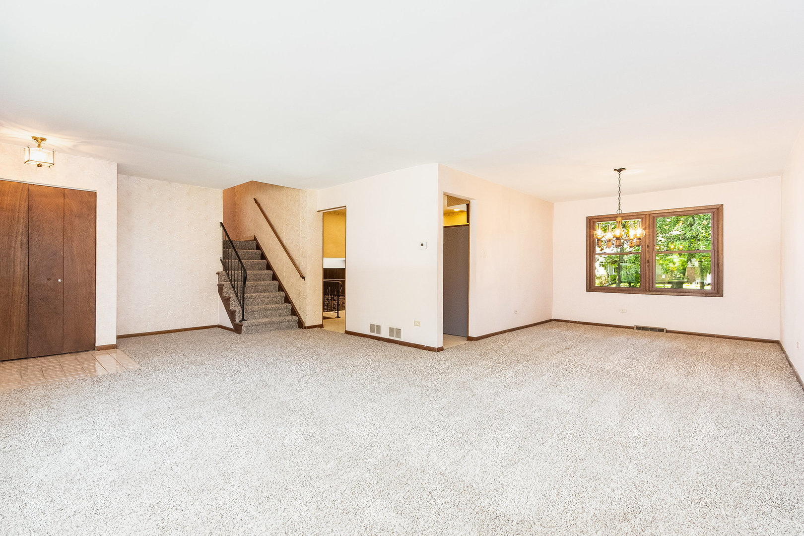 17010 Gaynelle Road Tinley Park, IL 60477 - Photo 2 of 19 an empty room with windows