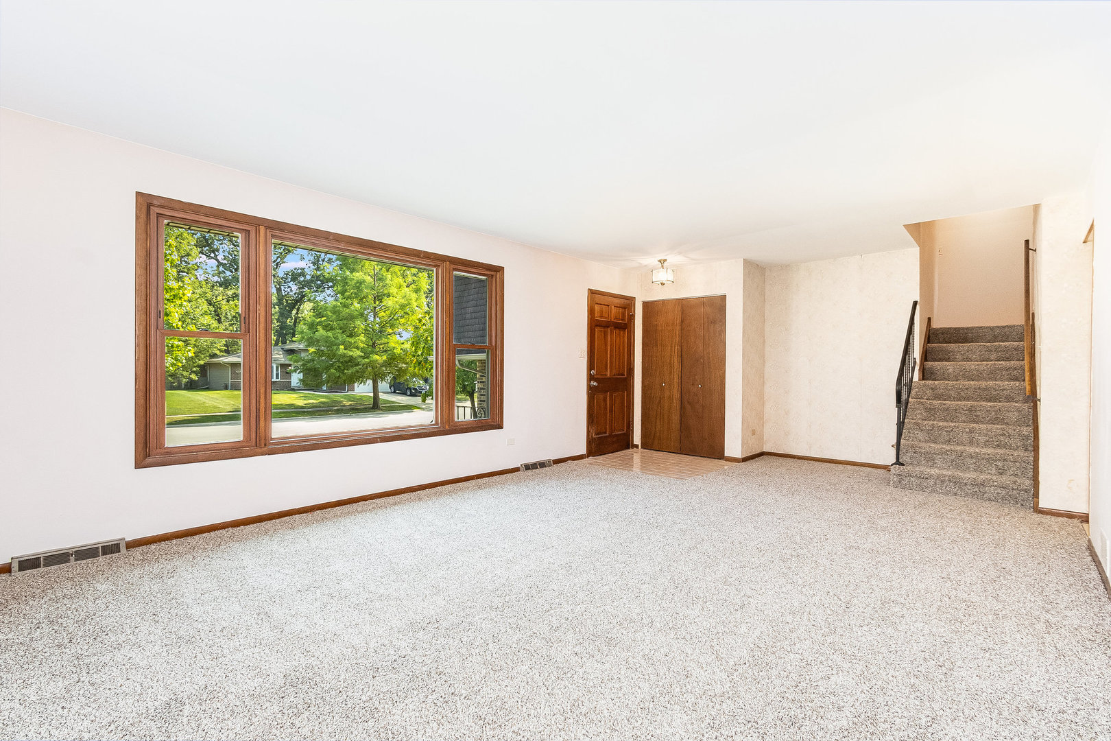 17010 Gaynelle Road Tinley Park, IL 60477 - Photo 3 of 19 an empty room with windows