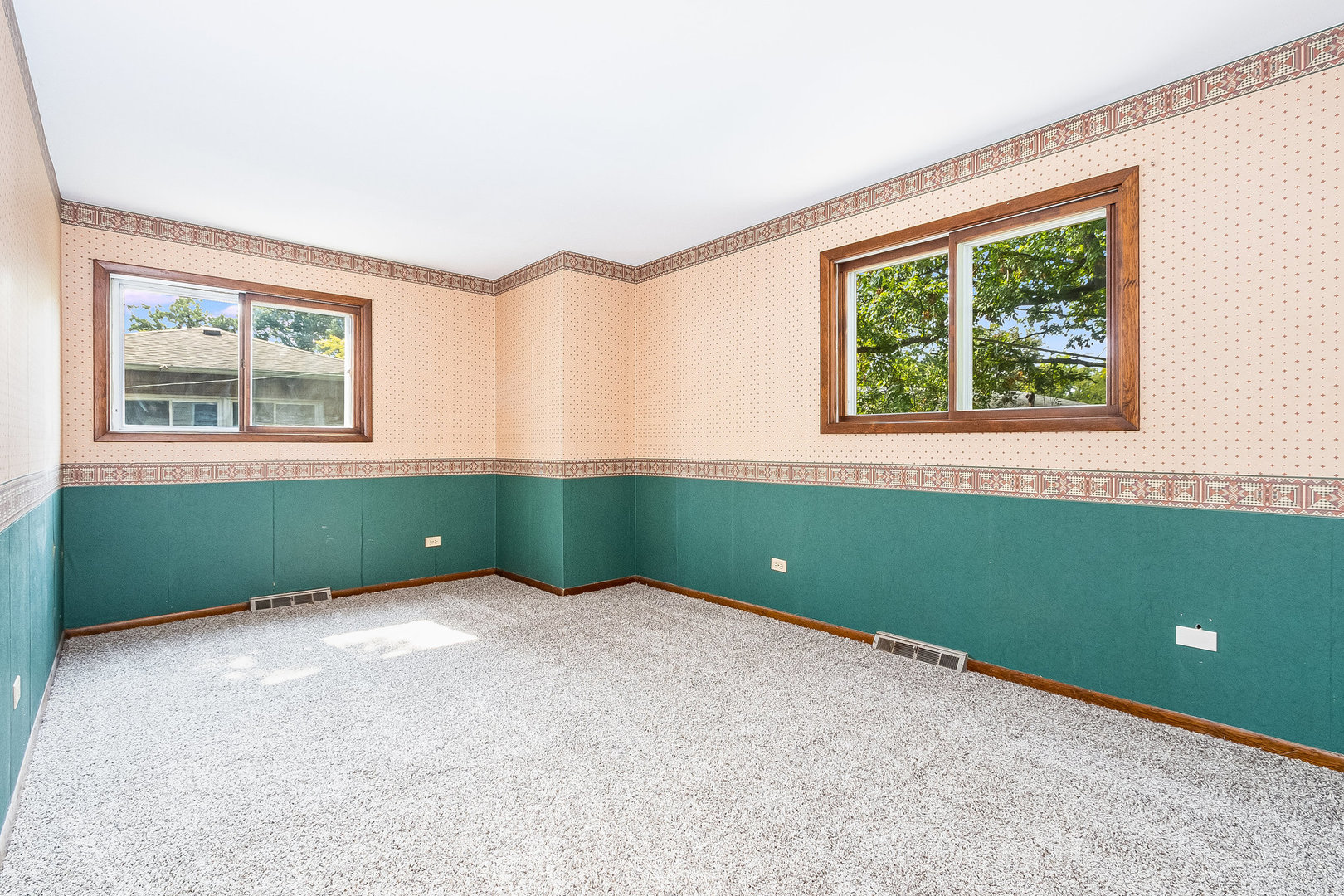 17010 Gaynelle Road Tinley Park, IL 60477 - Photo 10 of 19 a bedroom with a window and a green space