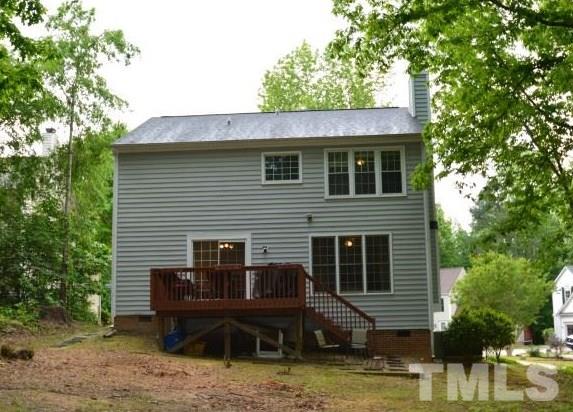 6208 Brielson Place Raleigh, NC 27616 - Photo 18 of 18 a front view of a house with garden