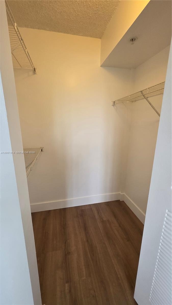 12136 St.Andrews Place, Unit 108 Miramar, FL 33025 - Photo 19 of 43 a view of small space with wooden floor