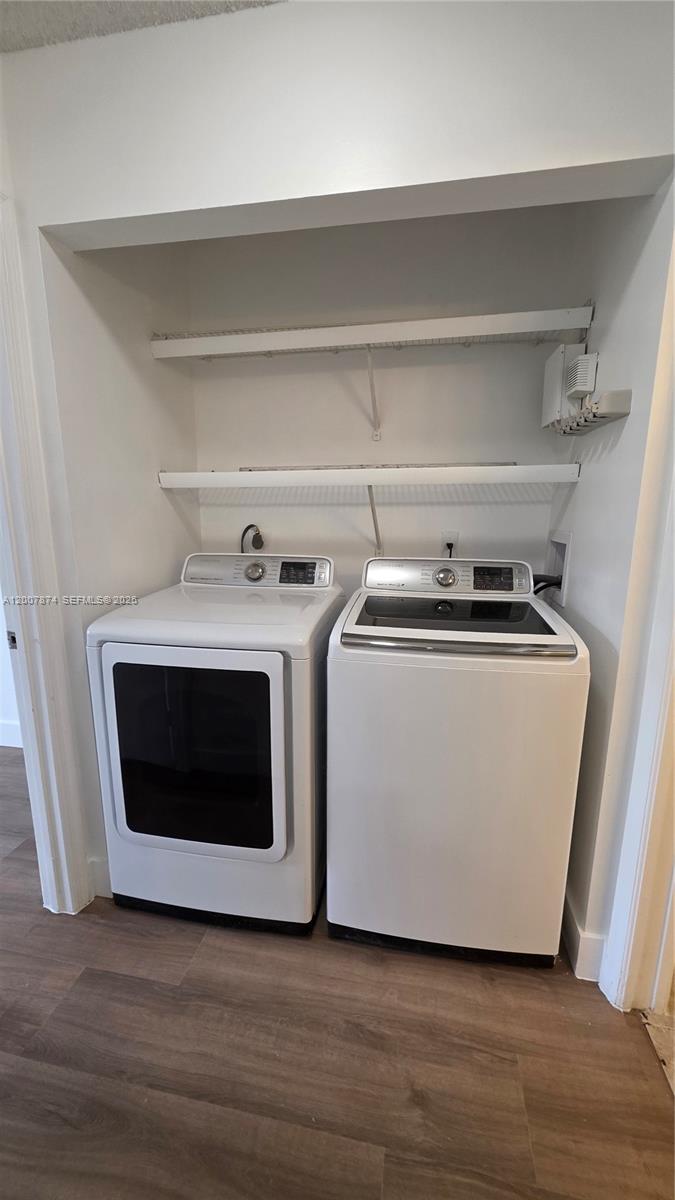 12136 St.Andrews Place, Unit 108 Miramar, FL 33025 - Photo 20 of 43 a utility room with washer and dryer