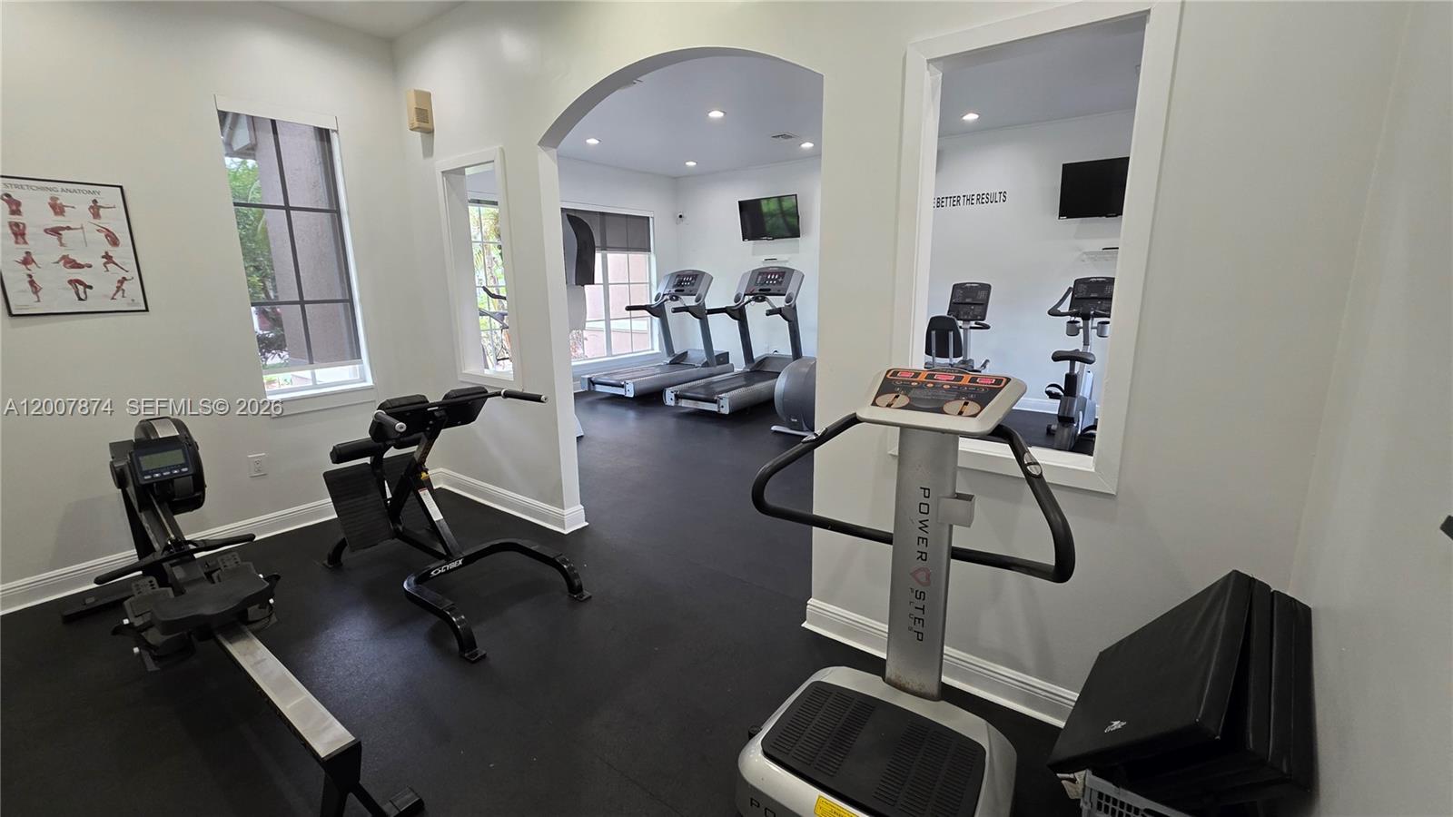 12136 St.Andrews Place, Unit 108 Miramar, FL 33025 - Photo 33 of 43 a view of a workspace with gym equipment