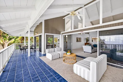 a lobby with furniture and rug floor