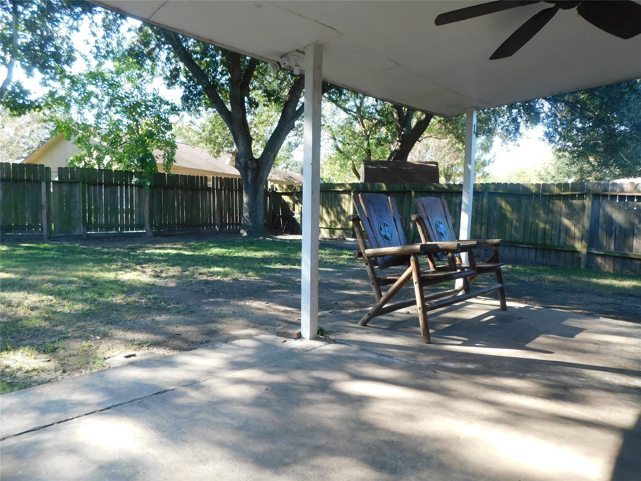 3014 Windemere Drive Pearland, TX 77584 - Photo 4 of 19 a view of a bench in a backyard