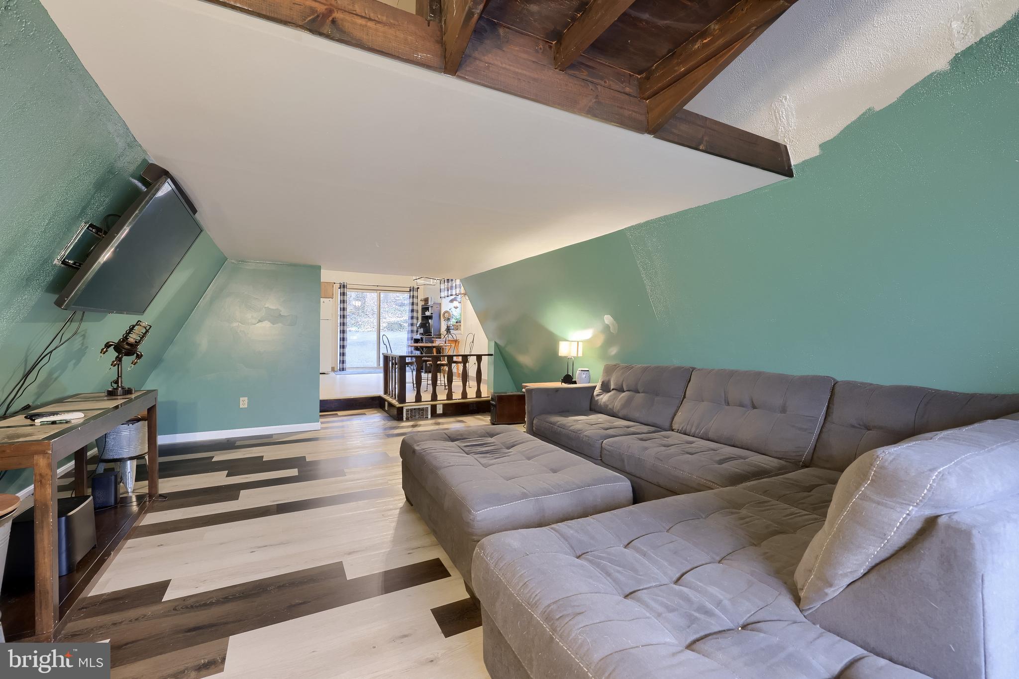 460 Greenville Road Denver, PA 17517 - Photo 11 of 50 a living room with furniture and a couch