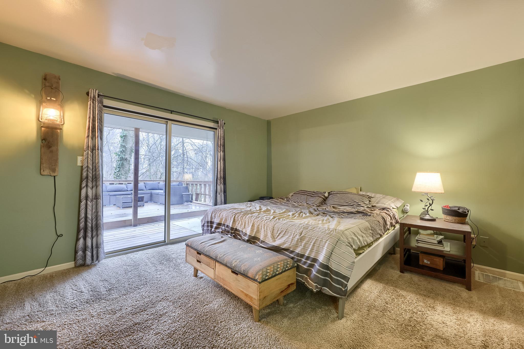 460 Greenville Road Denver, PA 17517 - Photo 13 of 50 a spacious bedroom with a bed and a window